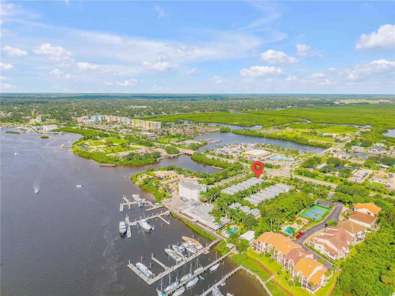 Photo 2 of 20: Shows the marina, boat slips, restaruant and dry stack storage
