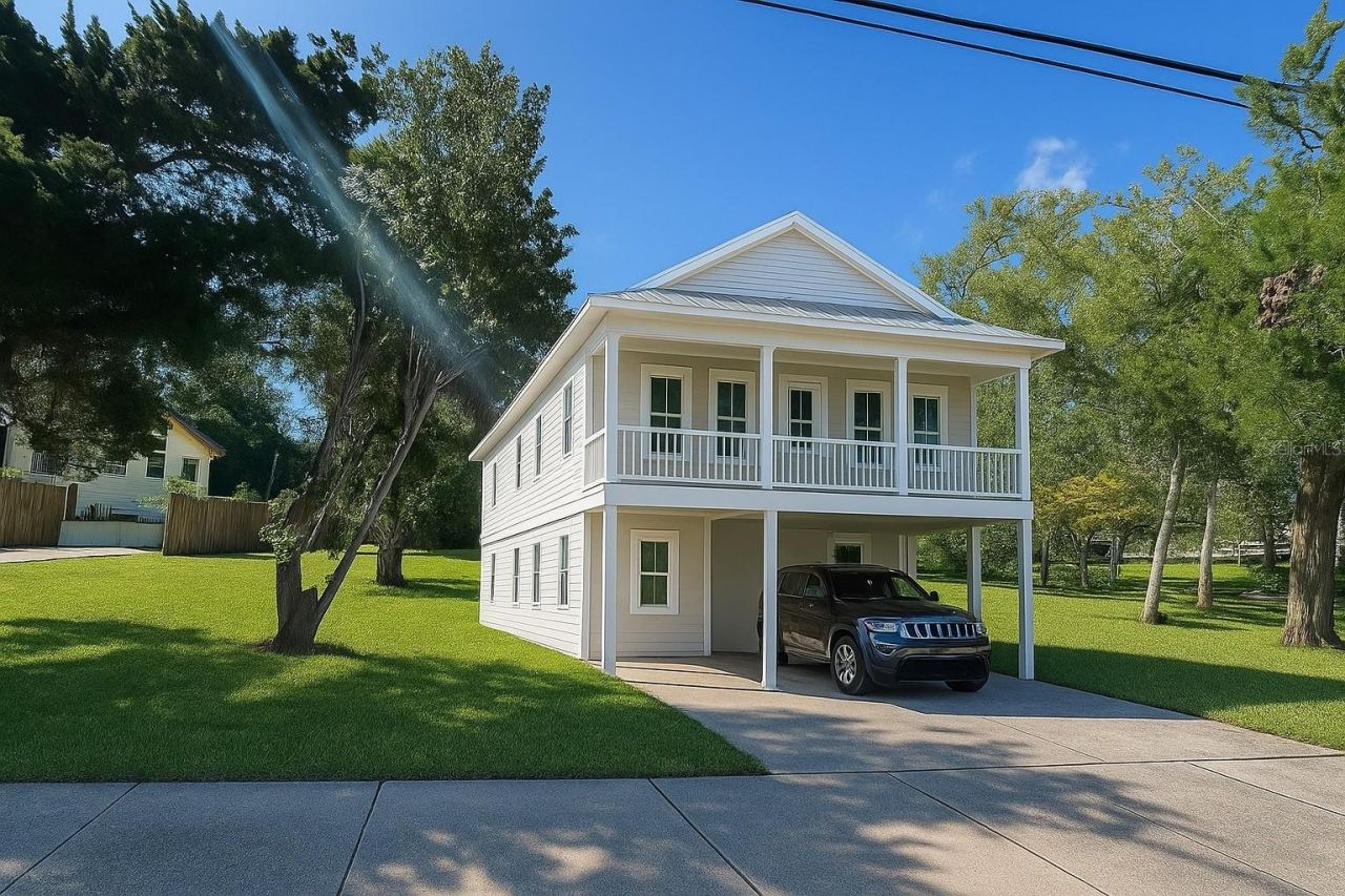 Photo 2 of 9: Lot with virtual image of possible dwelling.