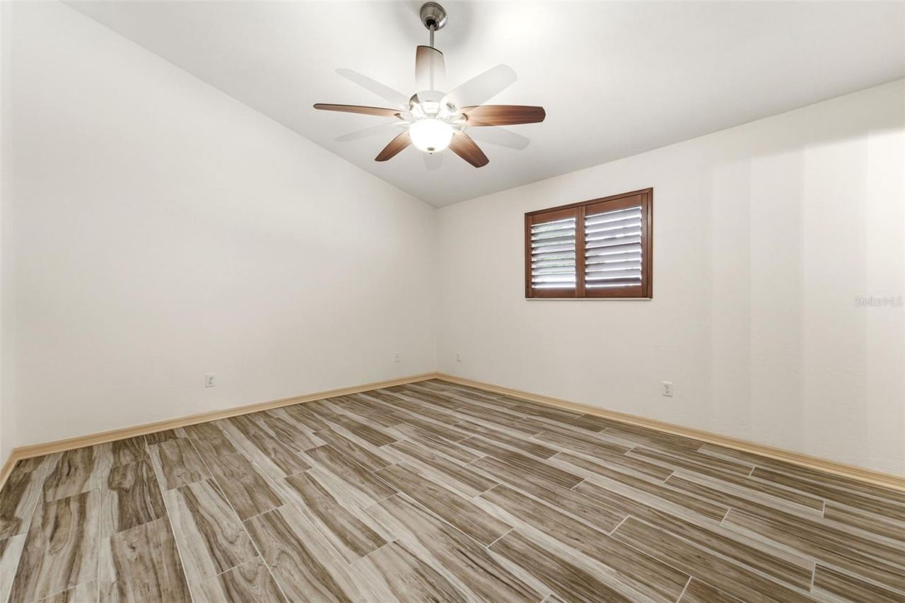 Photo 11 of 20: Bedroom three with comfortable secondary bedroom with generous natural light.
