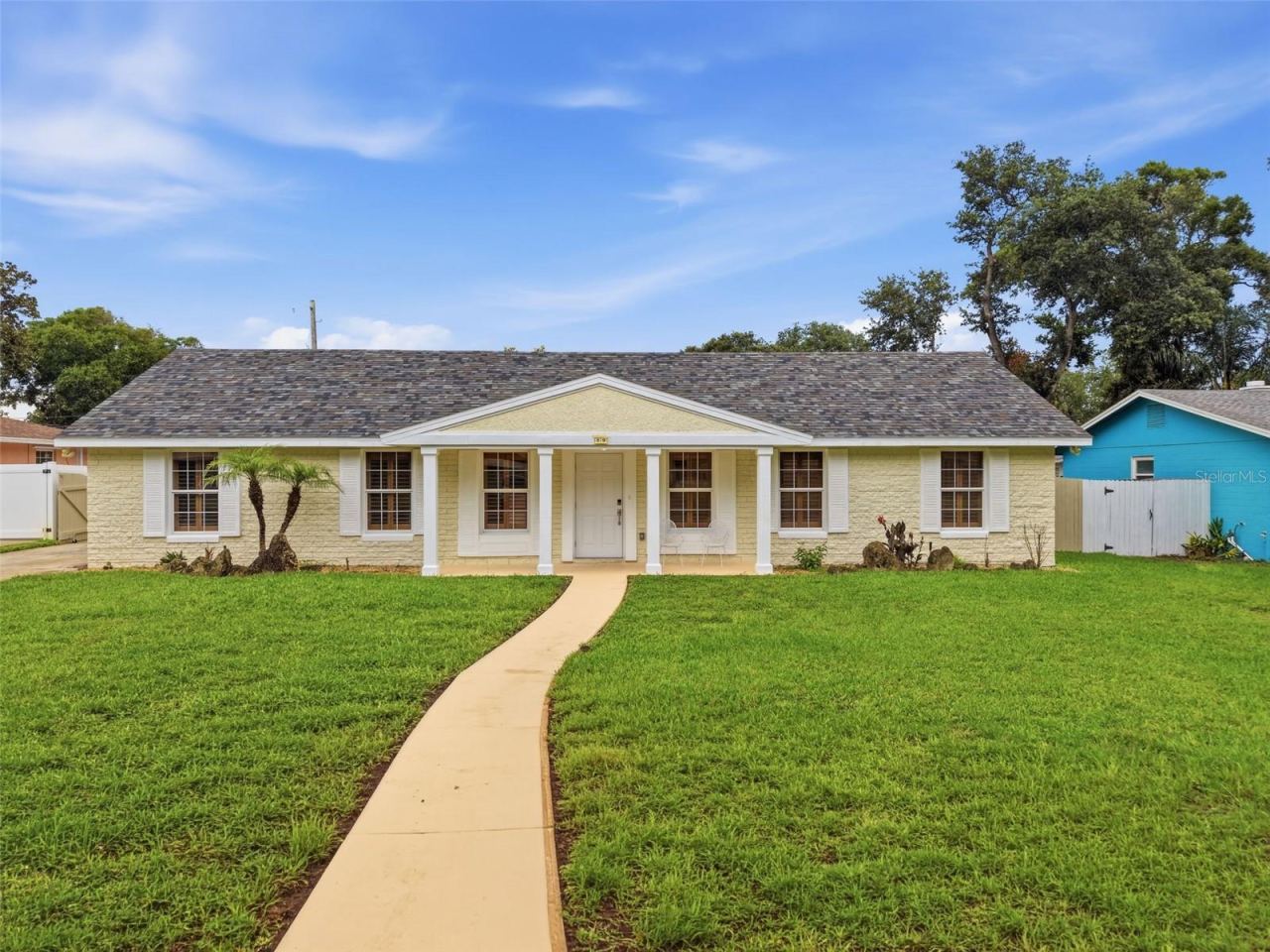 Photo 1 of 20: Welcome home to 59 Crestwood Circle—where timeless curb appeal meets modern Florida living.
