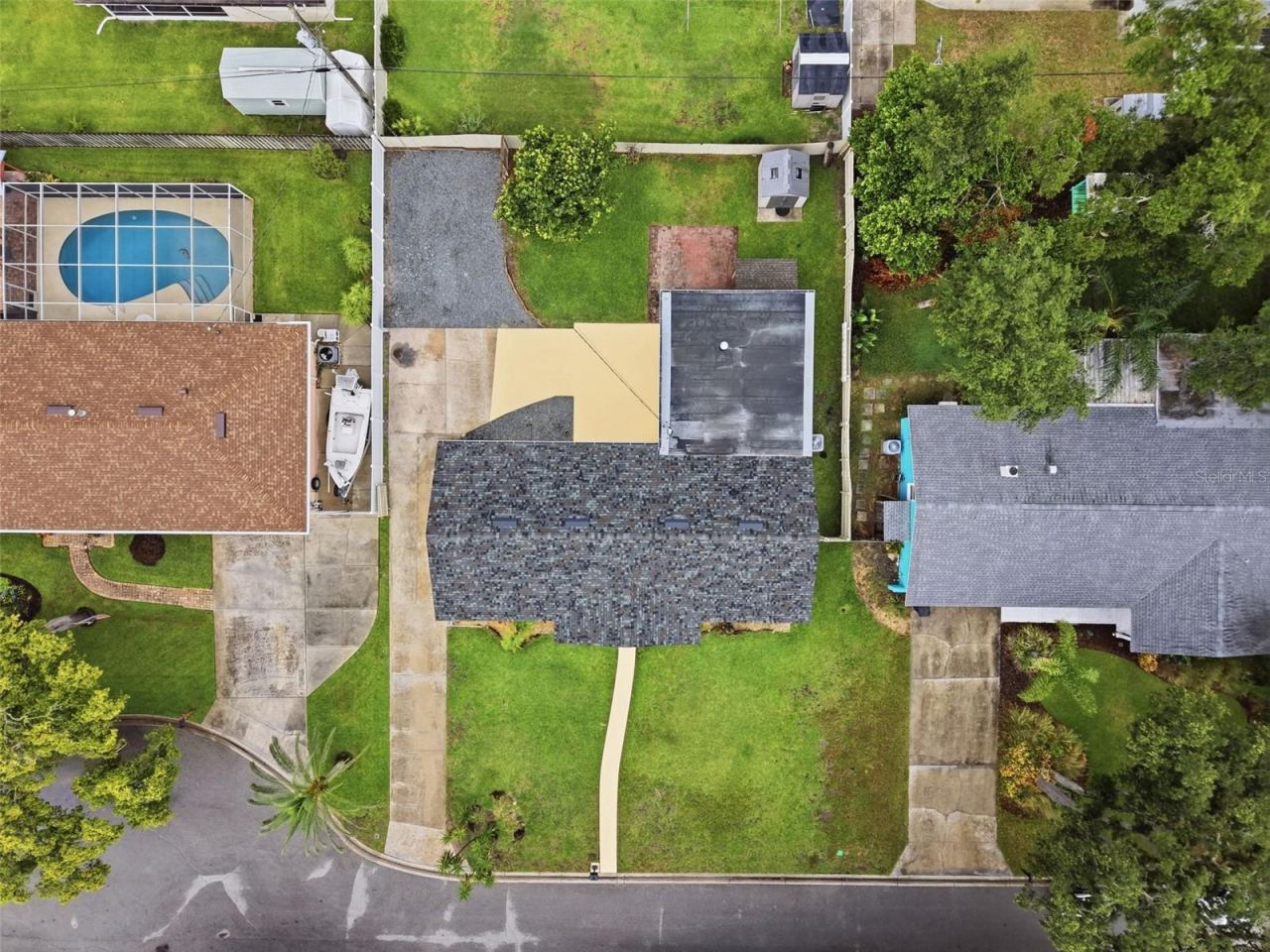 Photo 3 of 20: Enjoy a fully fenced backyard with plenty of room for entertaining, pets, or future outdoor additions.