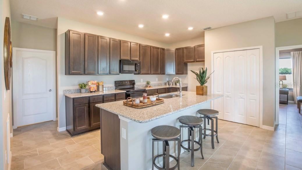 Photo 2 of 16: Model home - actual features may vary.