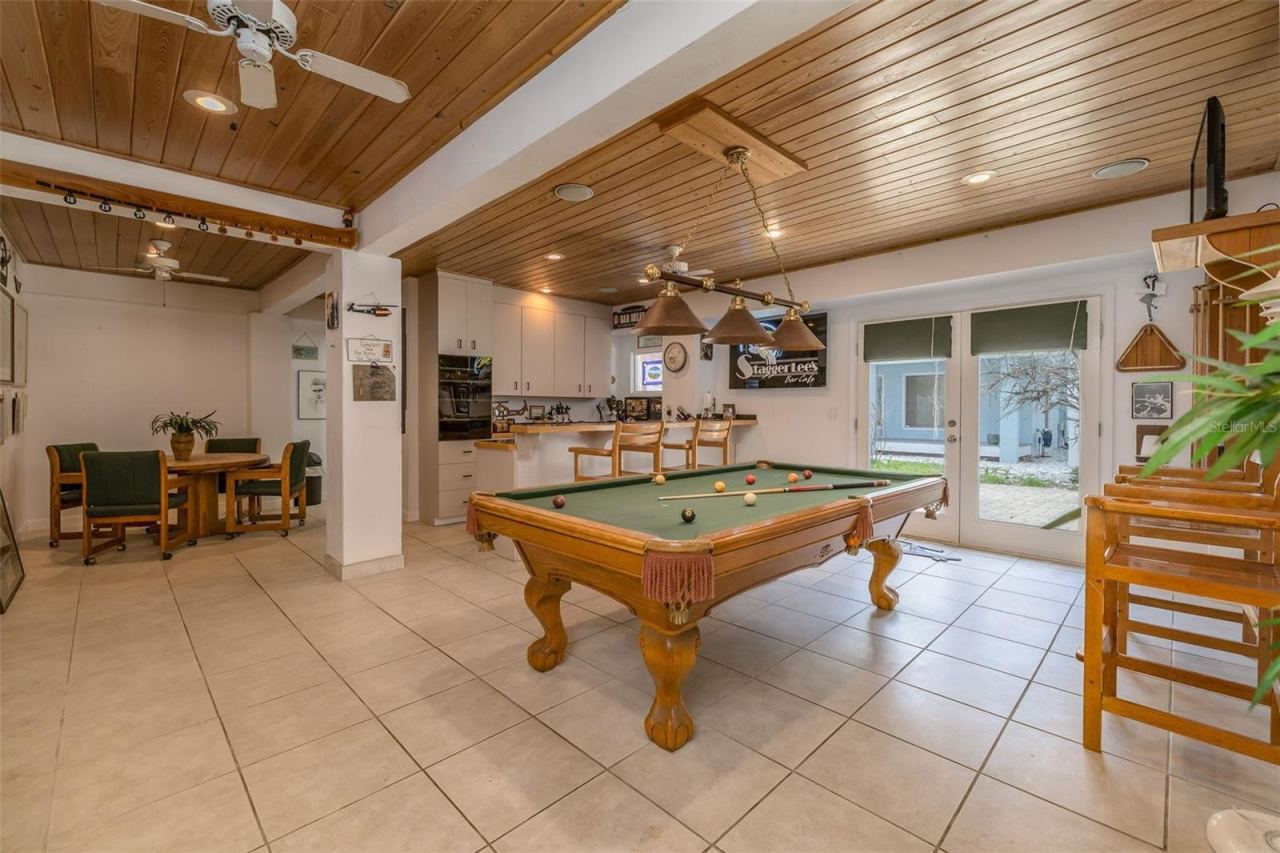 Photo 8 of 20: Gameroom has billard & poker table & gorgeous wood ceilings!
