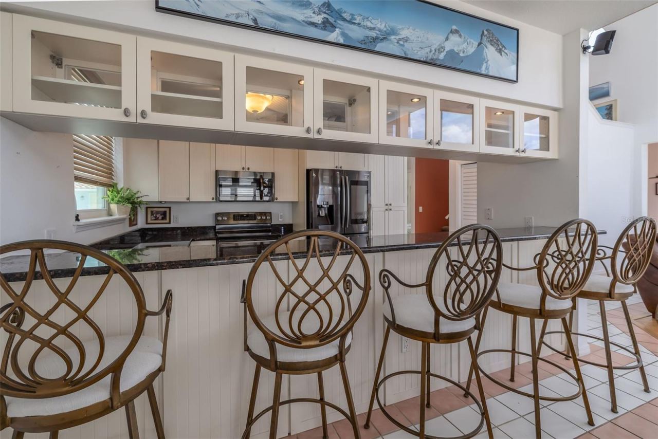 Photo 11 of 20: Counter bar with lighted cabinets!