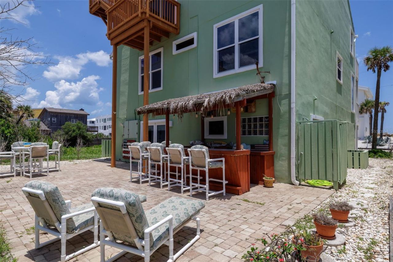 Photo 4 of 20: Tiki hut on pavered patio great for entertaining!