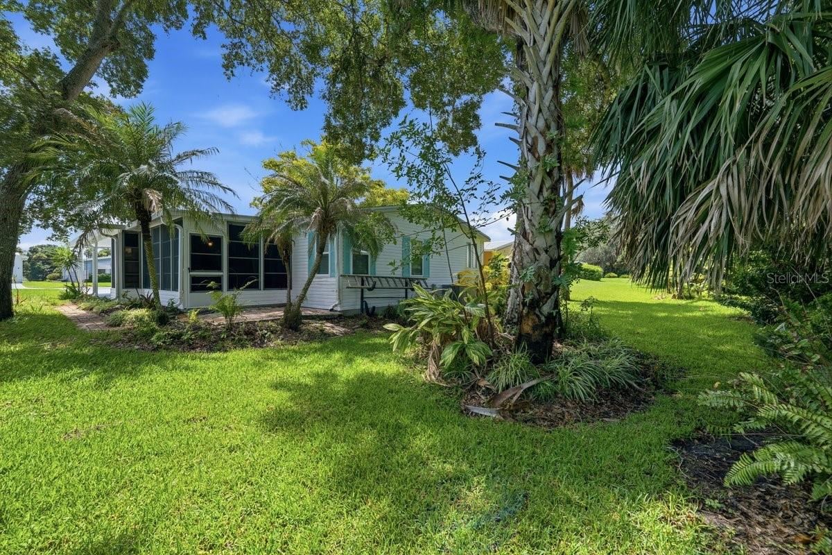 Photo 3 of 20: Backyard of property; no direct rear neighbors. Notice the Florida Room on back.