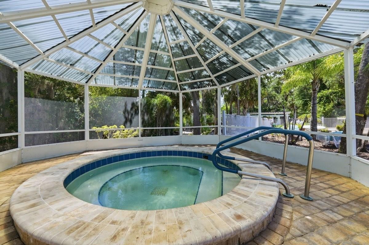 Photo 7 of 20: Screened in Hot Tub