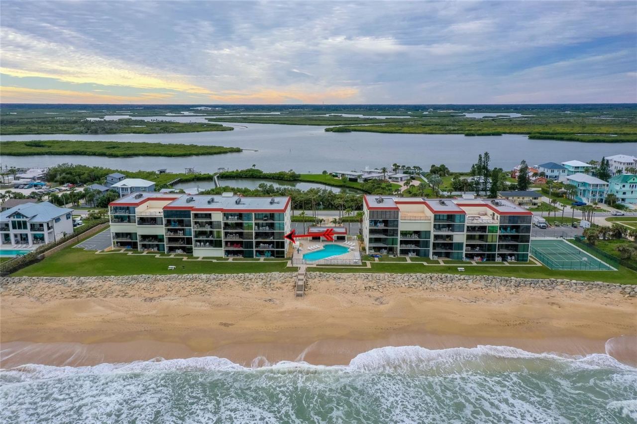 Photo 3 of 20: A sweeping ocean-facing view captures the full layout of the development, showcasing both the Atlantic beachfront and lush inland waterways beyond.