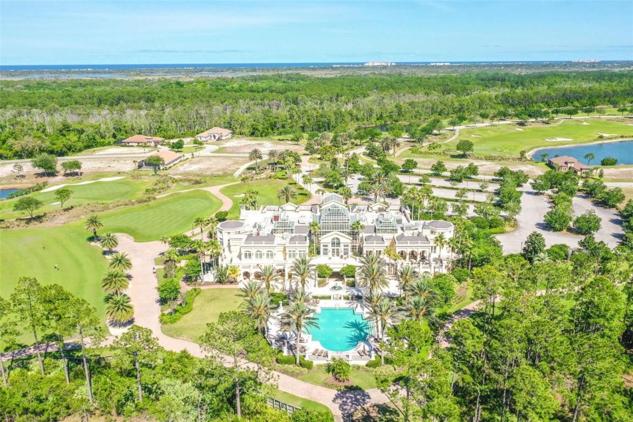 Photo 15 of 19: Aerial view of clubhouse and pool