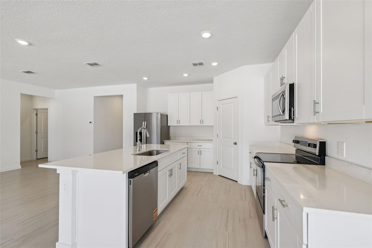 Photo 2 of 20: The interior photos are of another home with the same floor plan and interior finishes. Some details may vary
