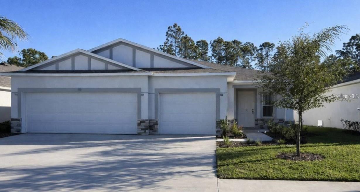 Photo 1 of 20: Model home - actual features may vary. - Block construction, stone accent & 3 car garage!