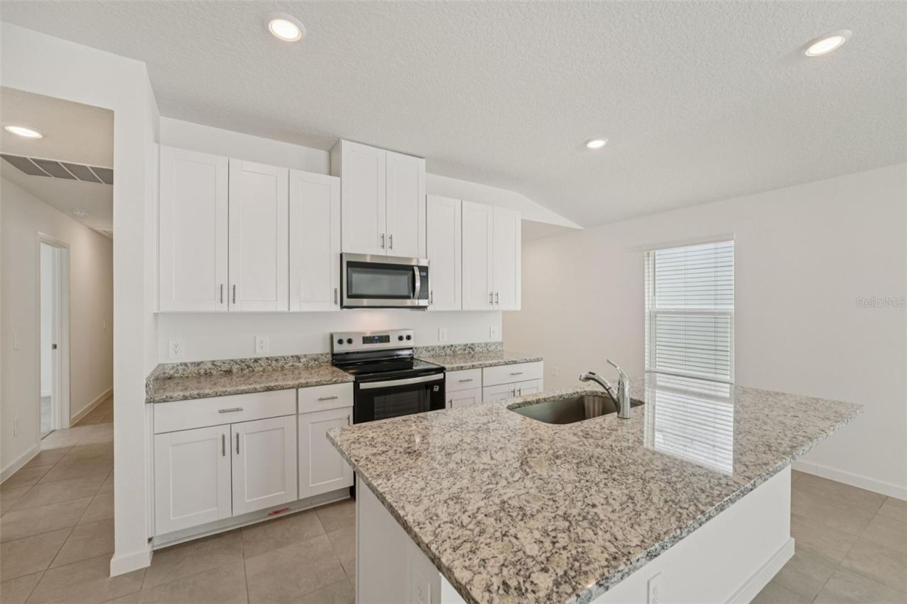 Photo 9 of 20: The interior photos are of another home with the same floor plan and interior finishes. Some details may vary