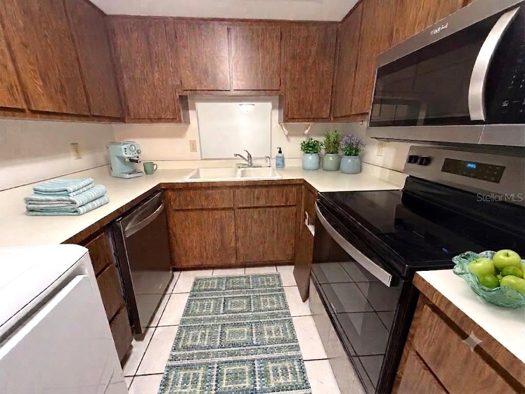 Photo 7 of 20: FULLY EQUIPPED KITCHEN WITH WASHER AND DRYER
