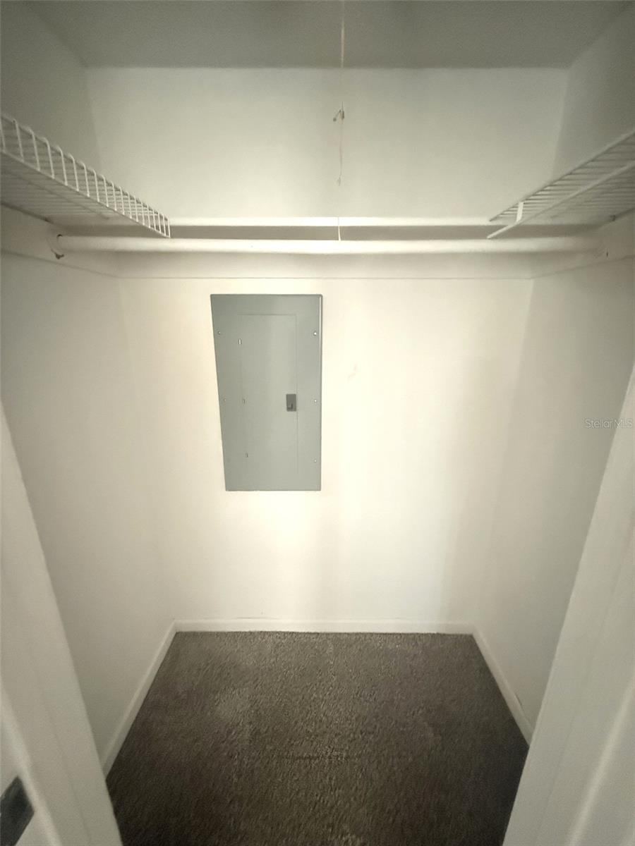 Photo 17 of 20: UNSTAGED GUEST WALK IN CLOSET