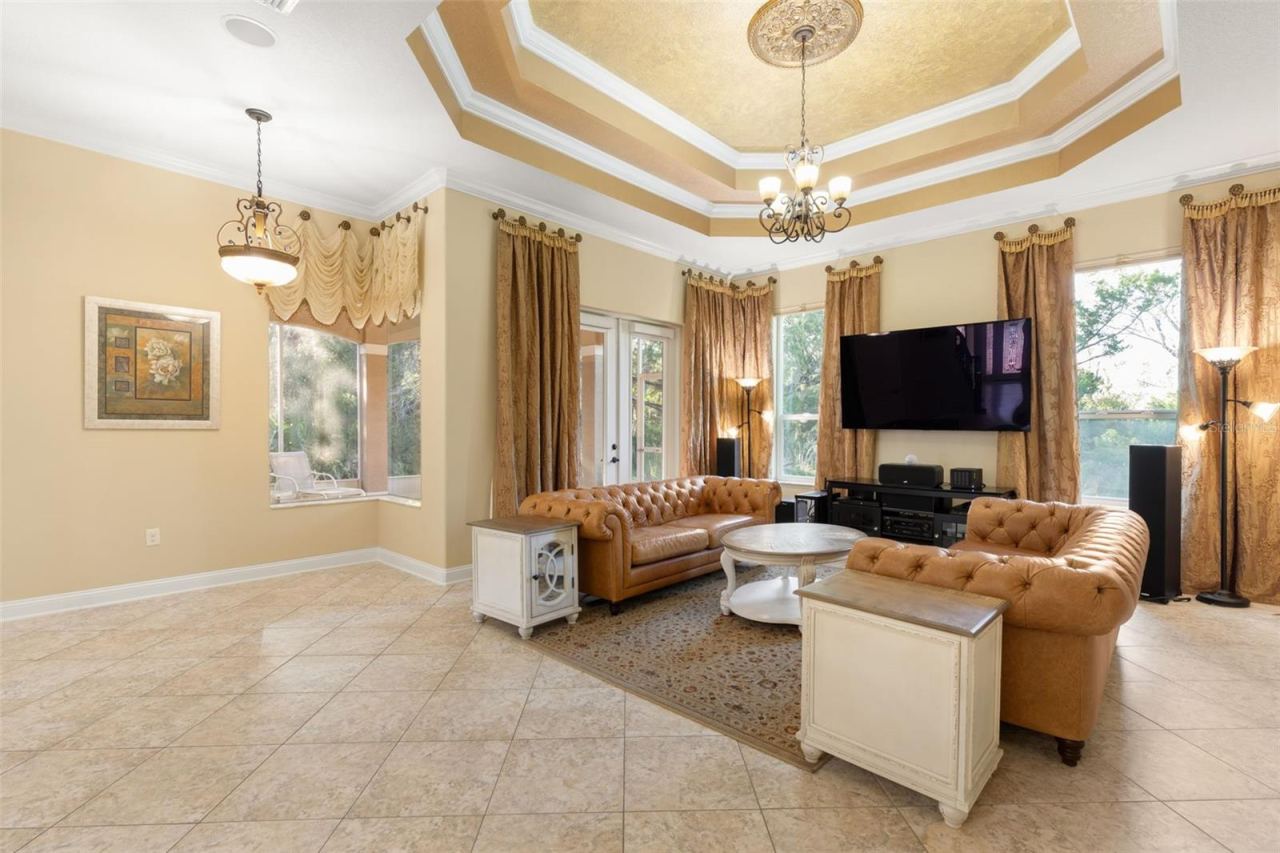 Photo 14 of 20: Generous floor space, beautiful natural light and architectural details make this gathering room a comfortable place to unwind or enjoy time with guests.