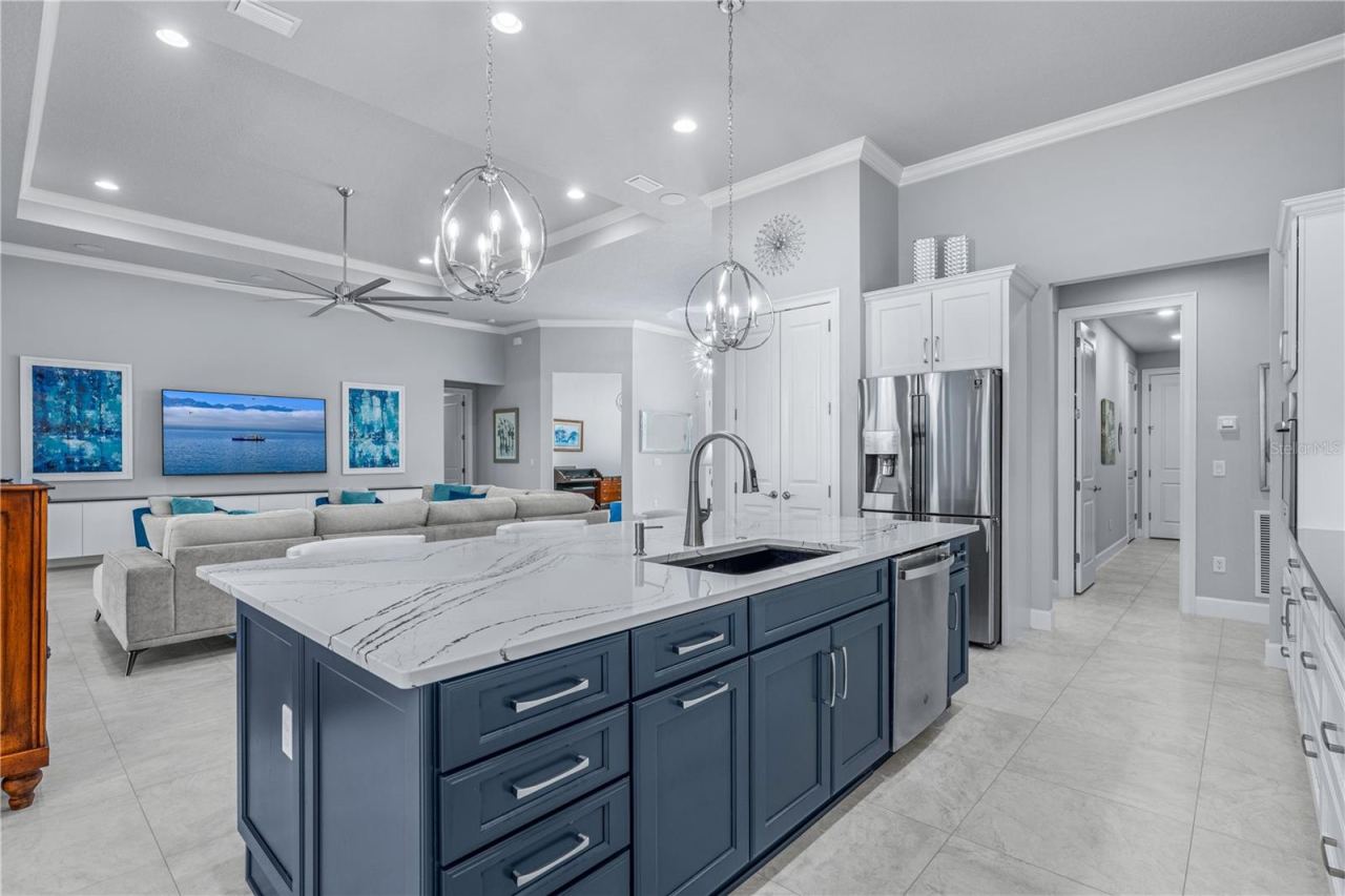 Photo 14 of 20: Gourmet Kitchen Open to Living Spaces
