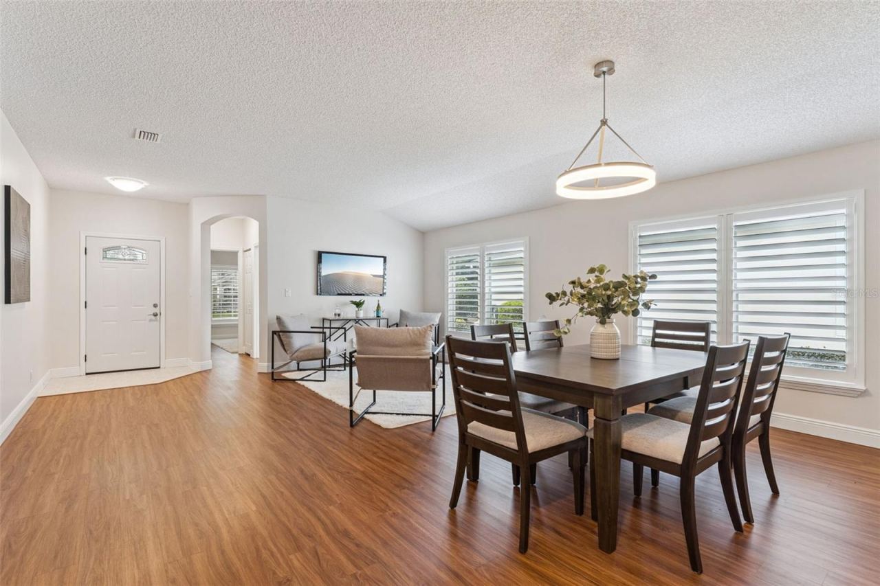Photo 4 of 20: View of the Living, Dining & Foyer areas