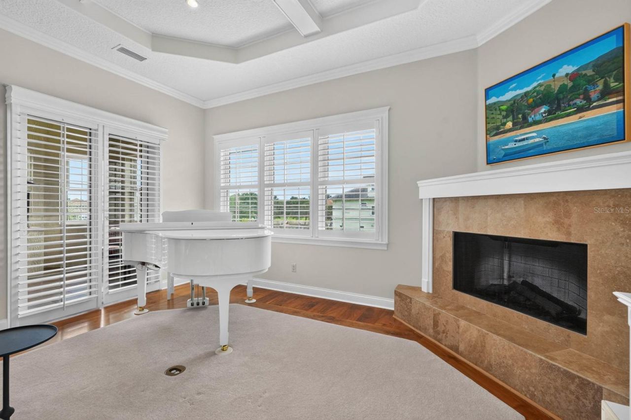 Photo 15 of 20: Three levels, three fireplaces... this one brings warmth and character to the heart of the second-floor living space.