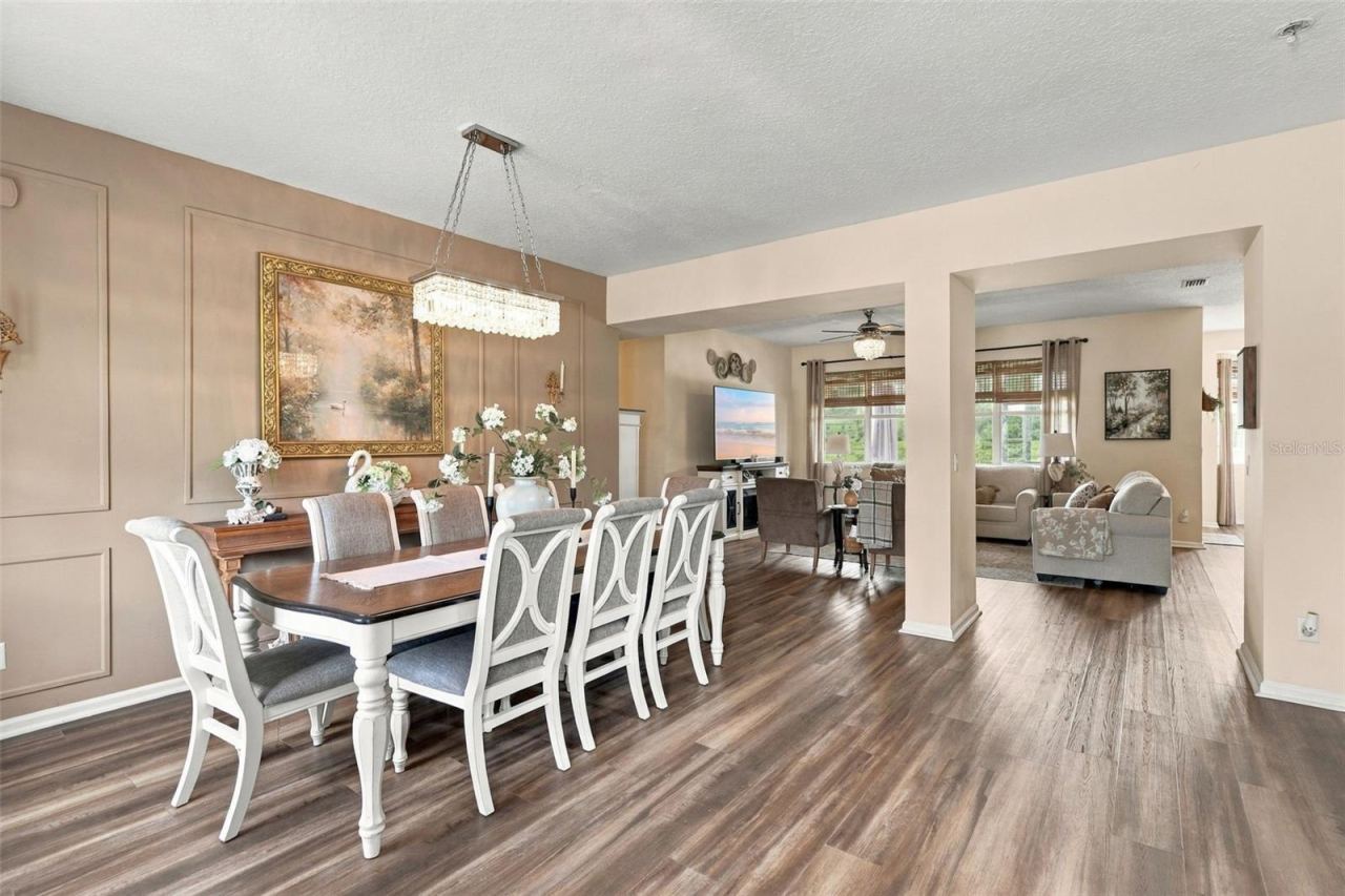 Photo 12 of 20: Front dining area towards main living area. The details are what makes this home so special.