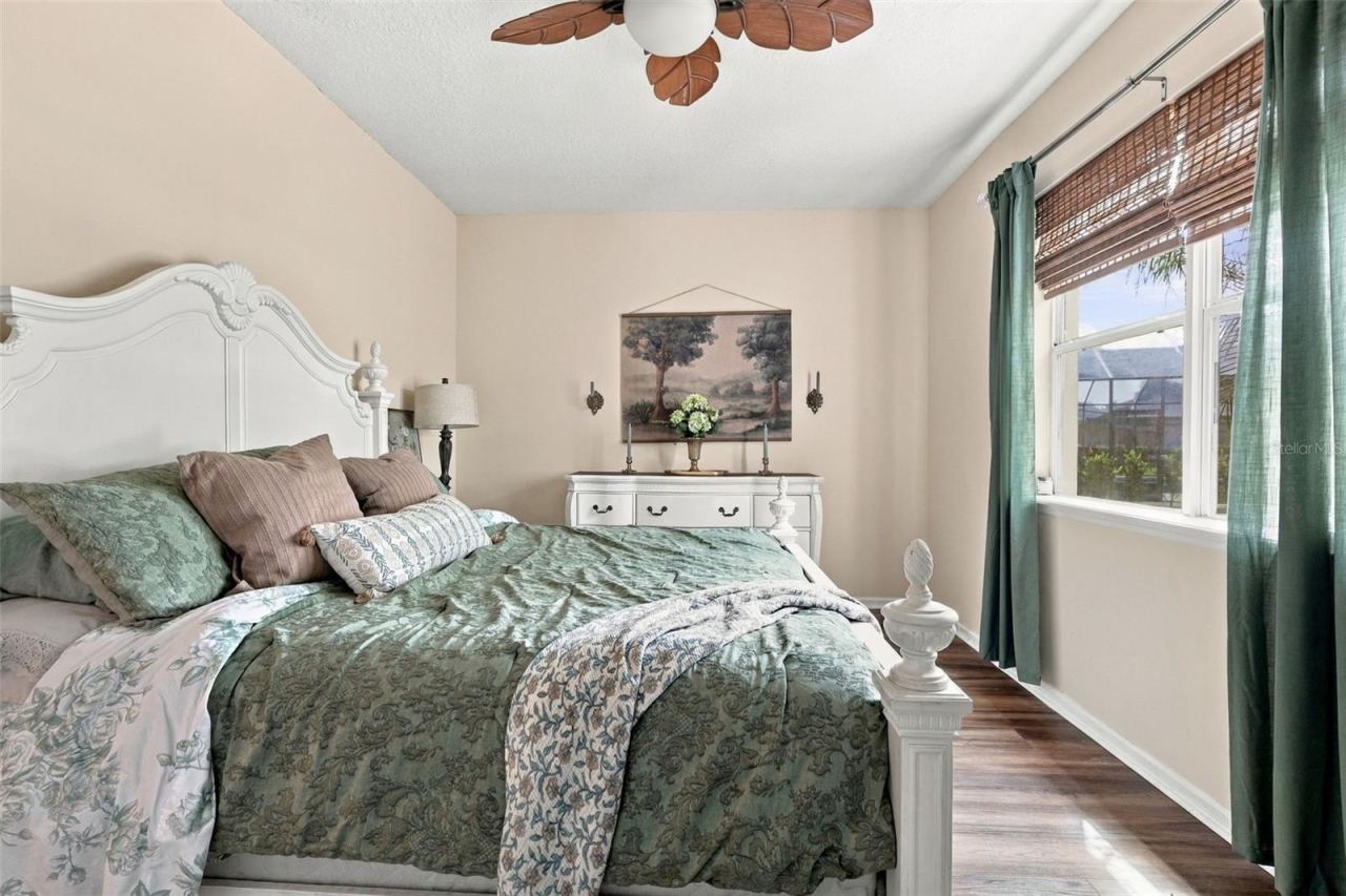 Photo 15 of 20: The main floor bedroom overlooks the pond.