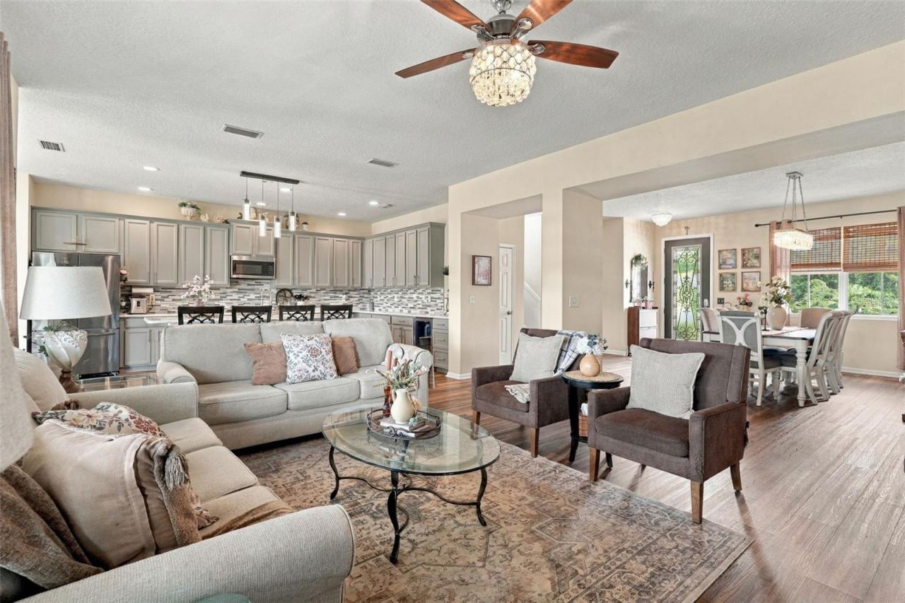 Photo 11 of 20: The main living area flows seamlessly with the kitchen and dining areas