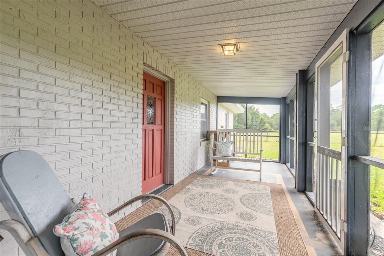 Photo 11 of 20: Screened front porch