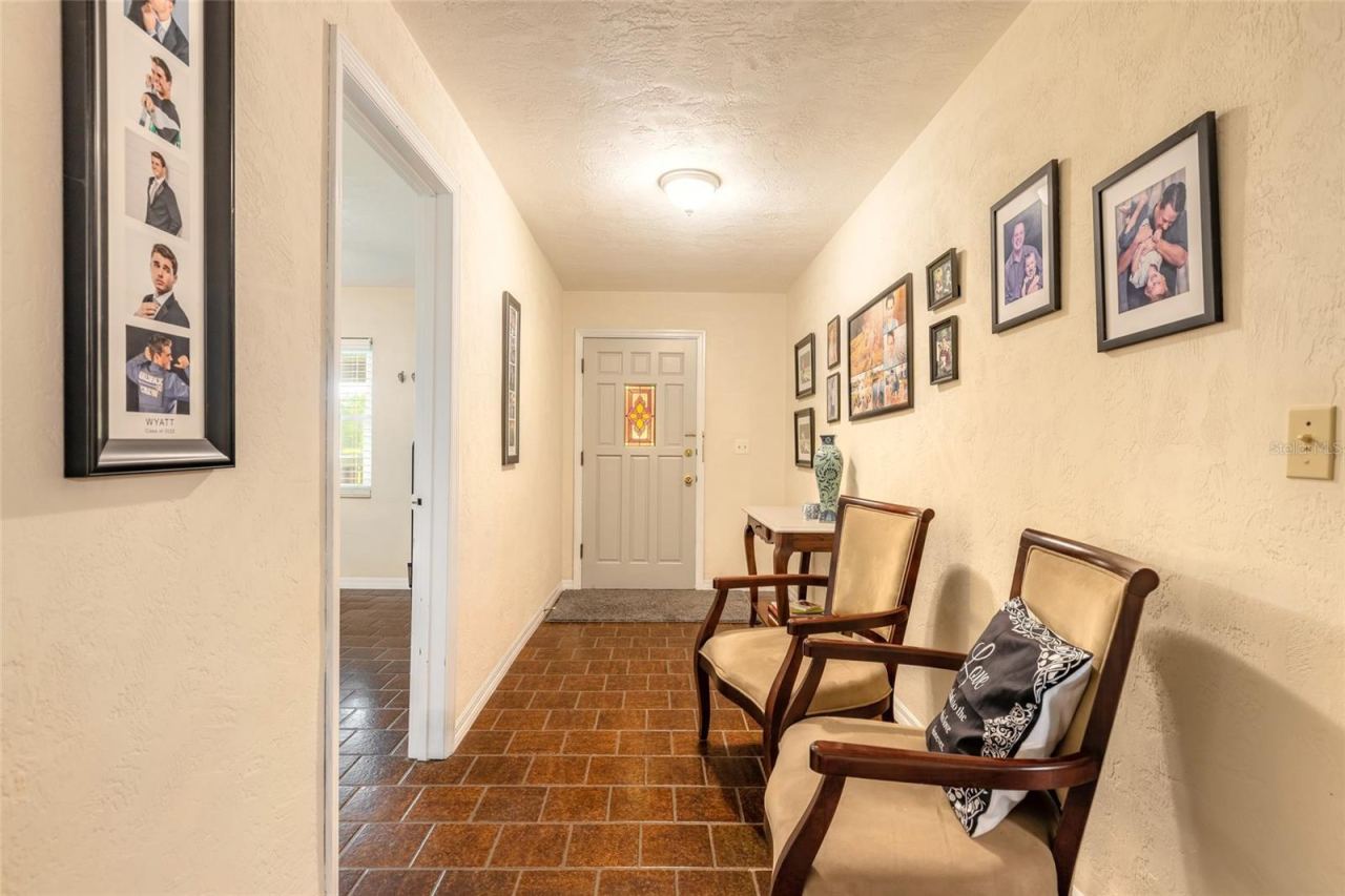 Photo 14 of 20: Entry foyer facing front door