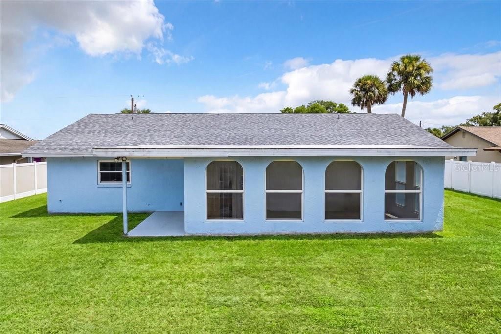 Photo 5 of 20: Spacious backyard & partially fenced!