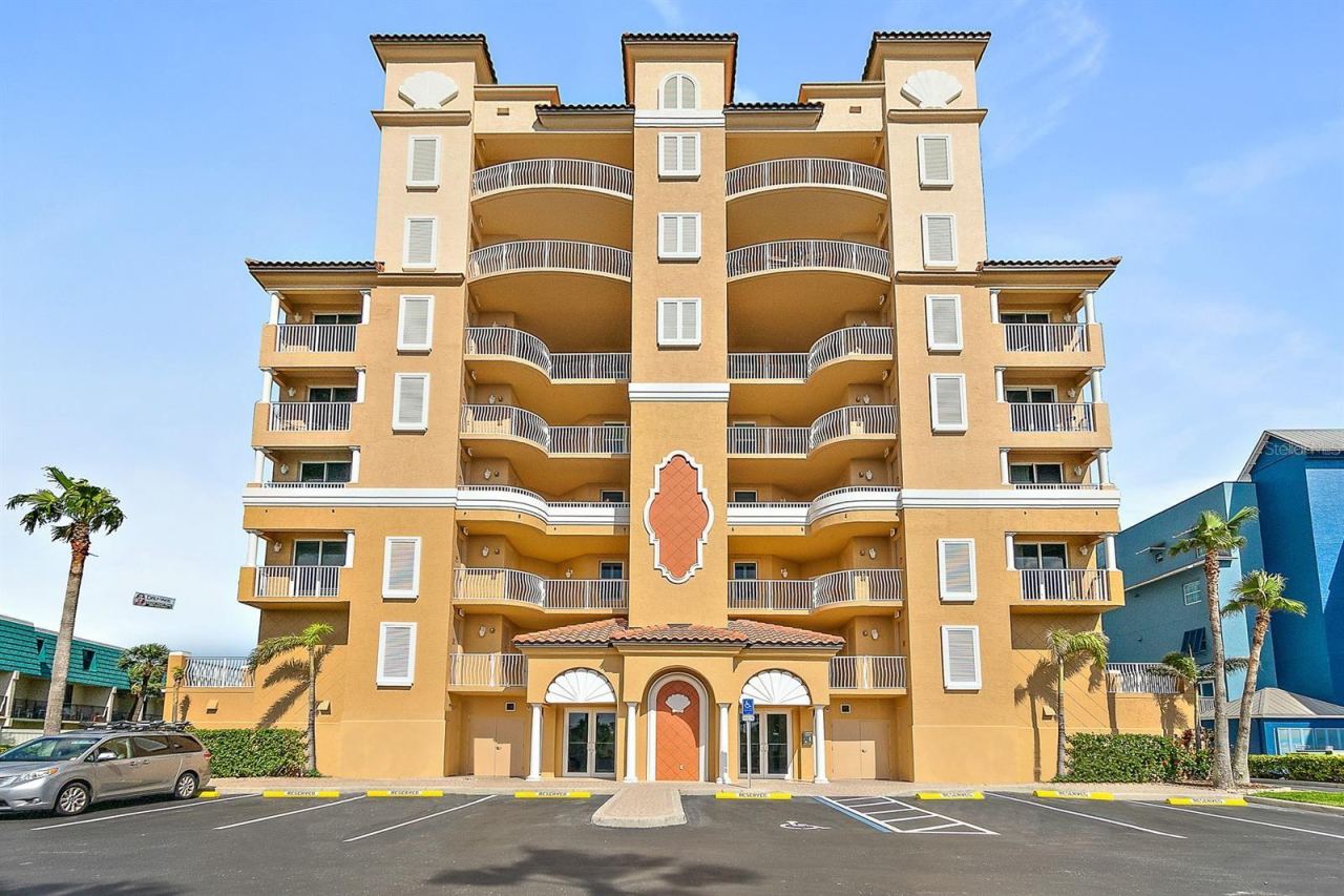 Photo 1 of 20: REAR OF CONDO WITH ARROW SHOWING LOCATION