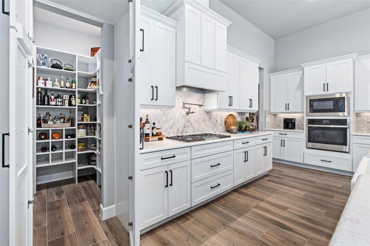 Photo 16 of 20: Kitchen & Hidden Pantry