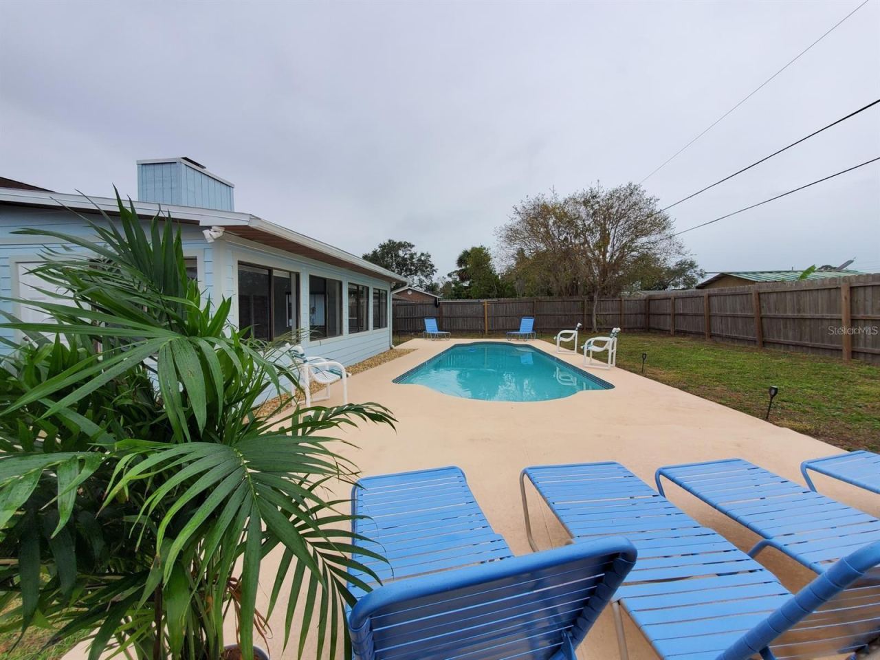 Photo 6 of 20: Pool deck to lounge in the sun. Electric heater.