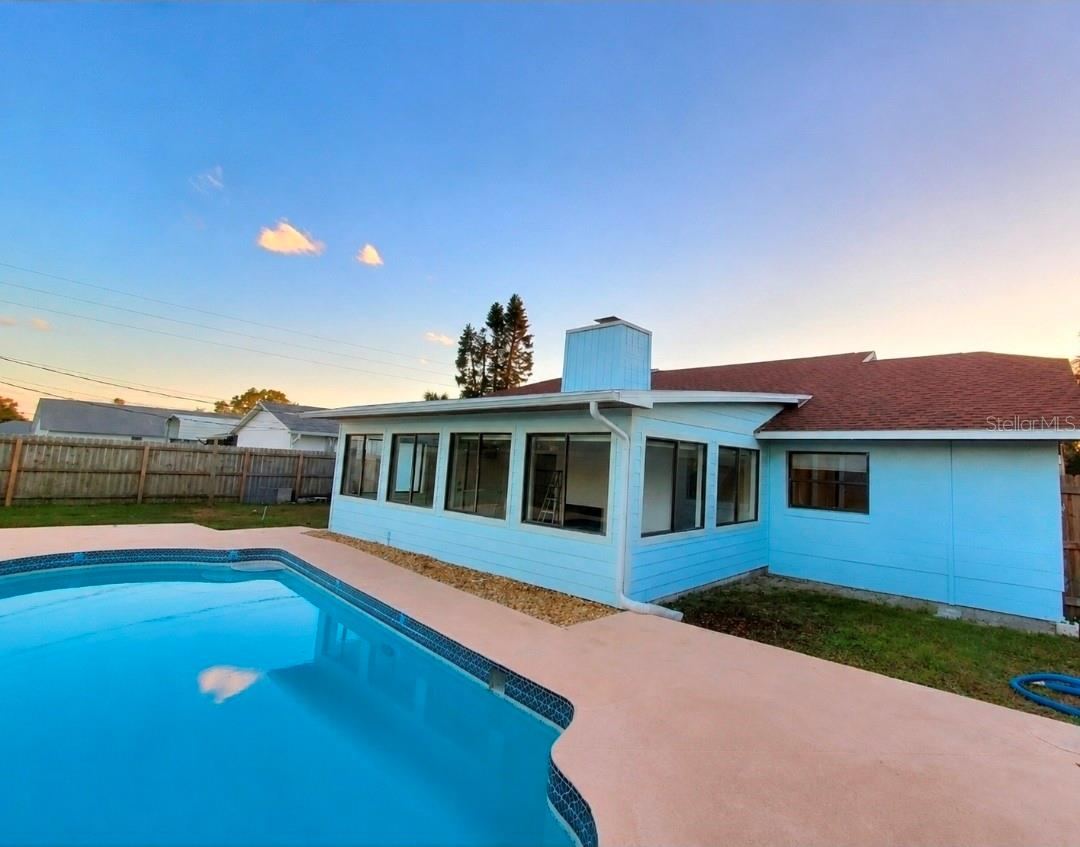 Photo 5 of 20: Backyard pool deckPool & back of house.