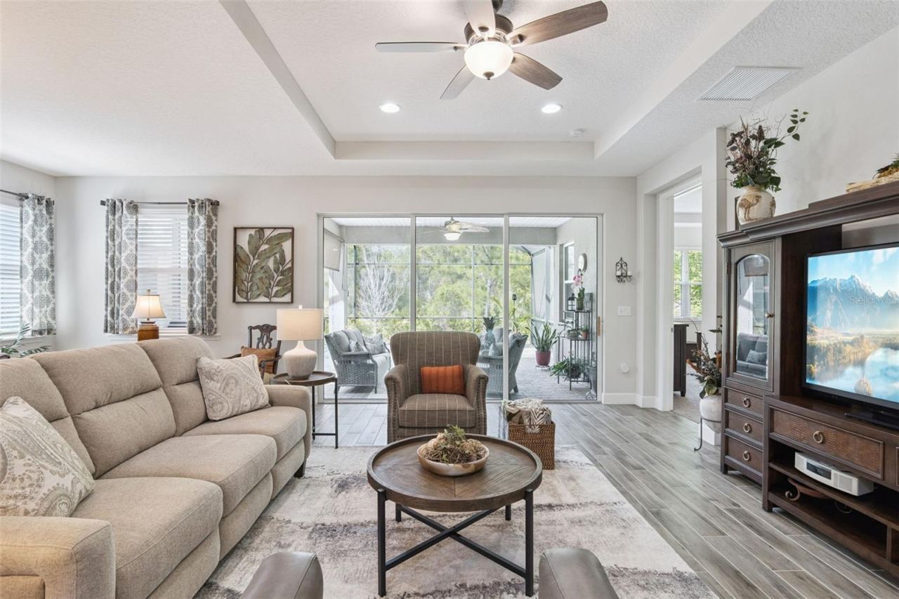 Photo 9 of 20: Triple sliders open to the oversized, expanded, screen Lanai