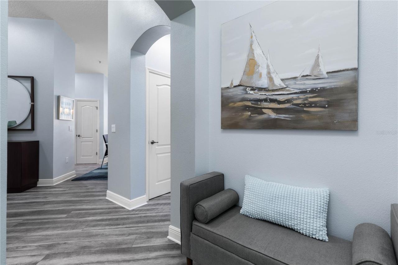 Photo 12 of 20: Foyer leads to Guest Bedrooms & Bathroom