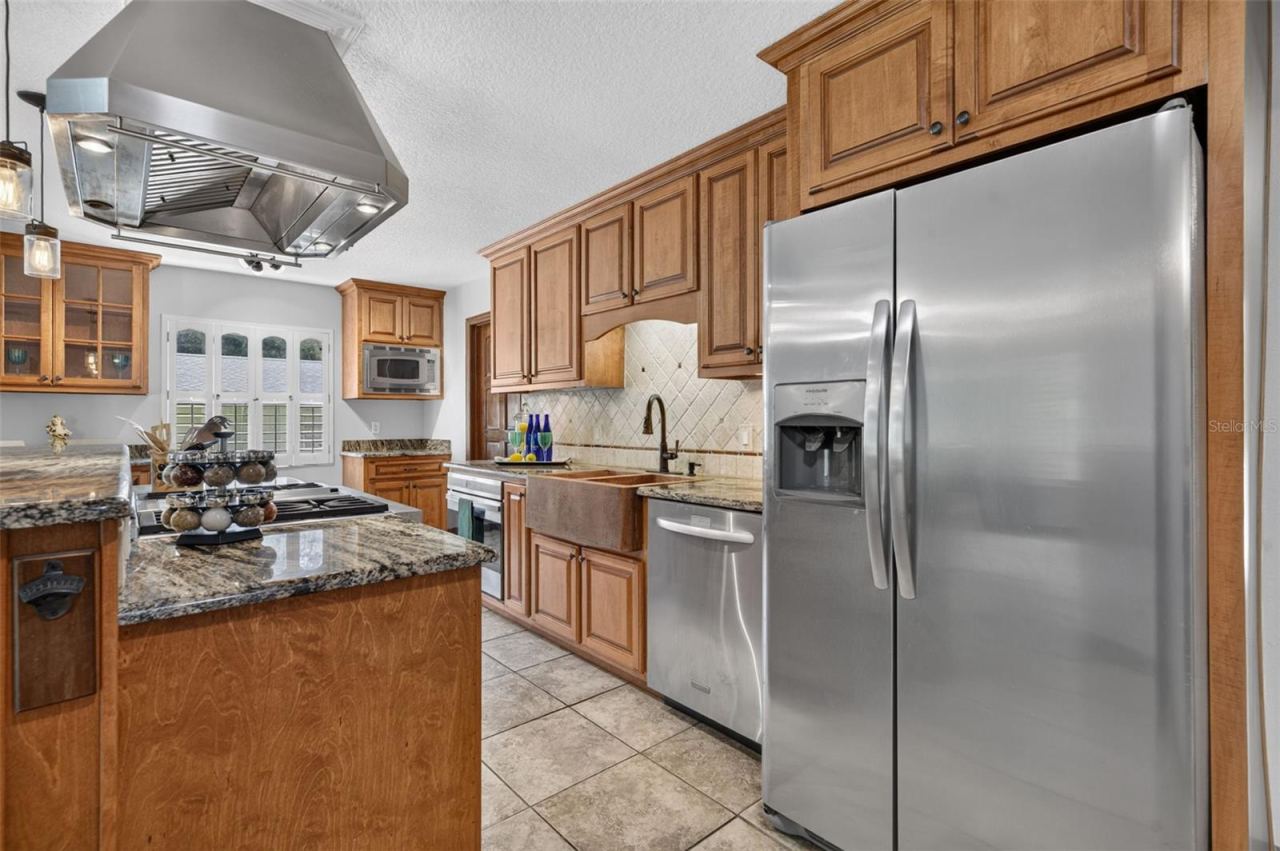 Photo 13 of 20: Wolf Gas Range, Dishwasher, Side-by Side Fridge, Separate Oven, Microwave.