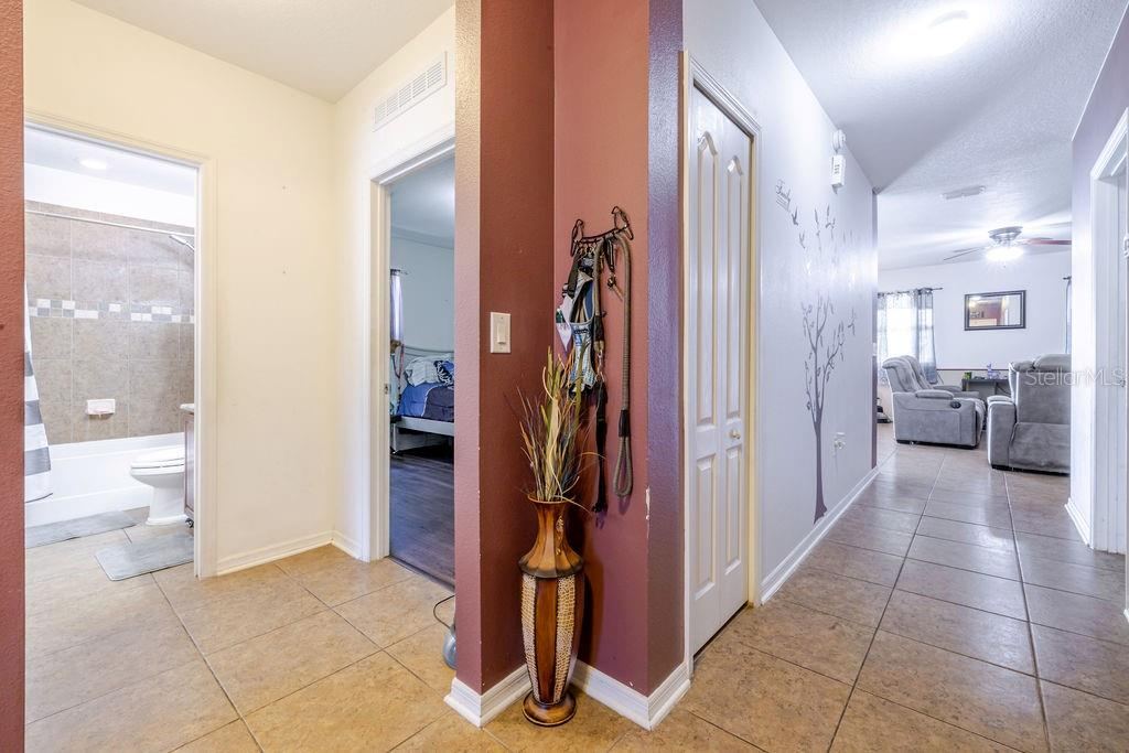 Photo 5 of 20: Entrance from foyer. 2 bedrooms and guest bathroom on the left.