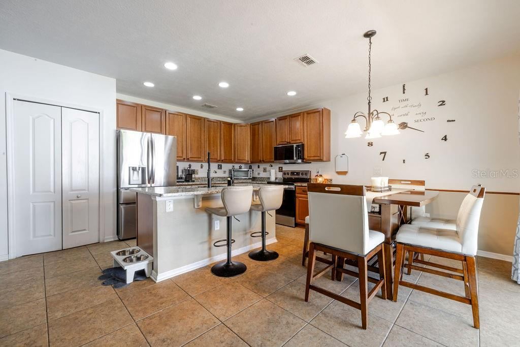 Photo 11 of 20: Kitchen with large island and dining area