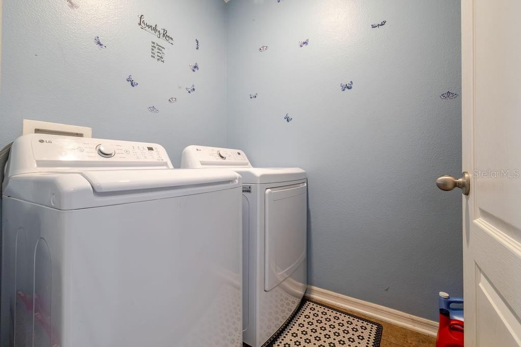 Photo 10 of 20: Inside laundry room and washer and dryer convey with home