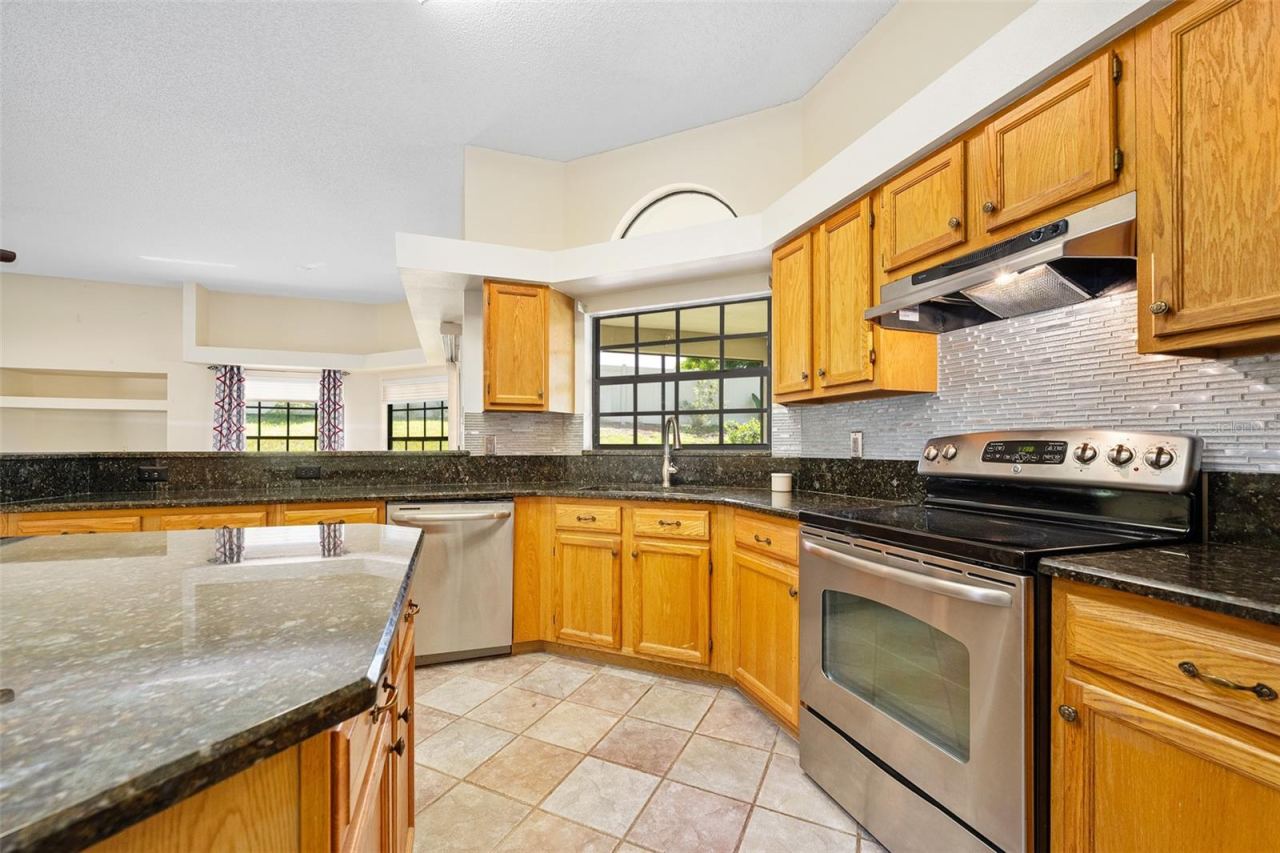 Photo 10 of 20: Wood cabinets and stainless appliances