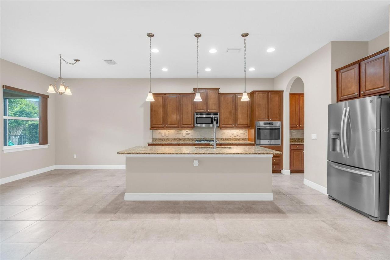 Photo 9 of 20: UNSTAGED KITCHEN / DINING