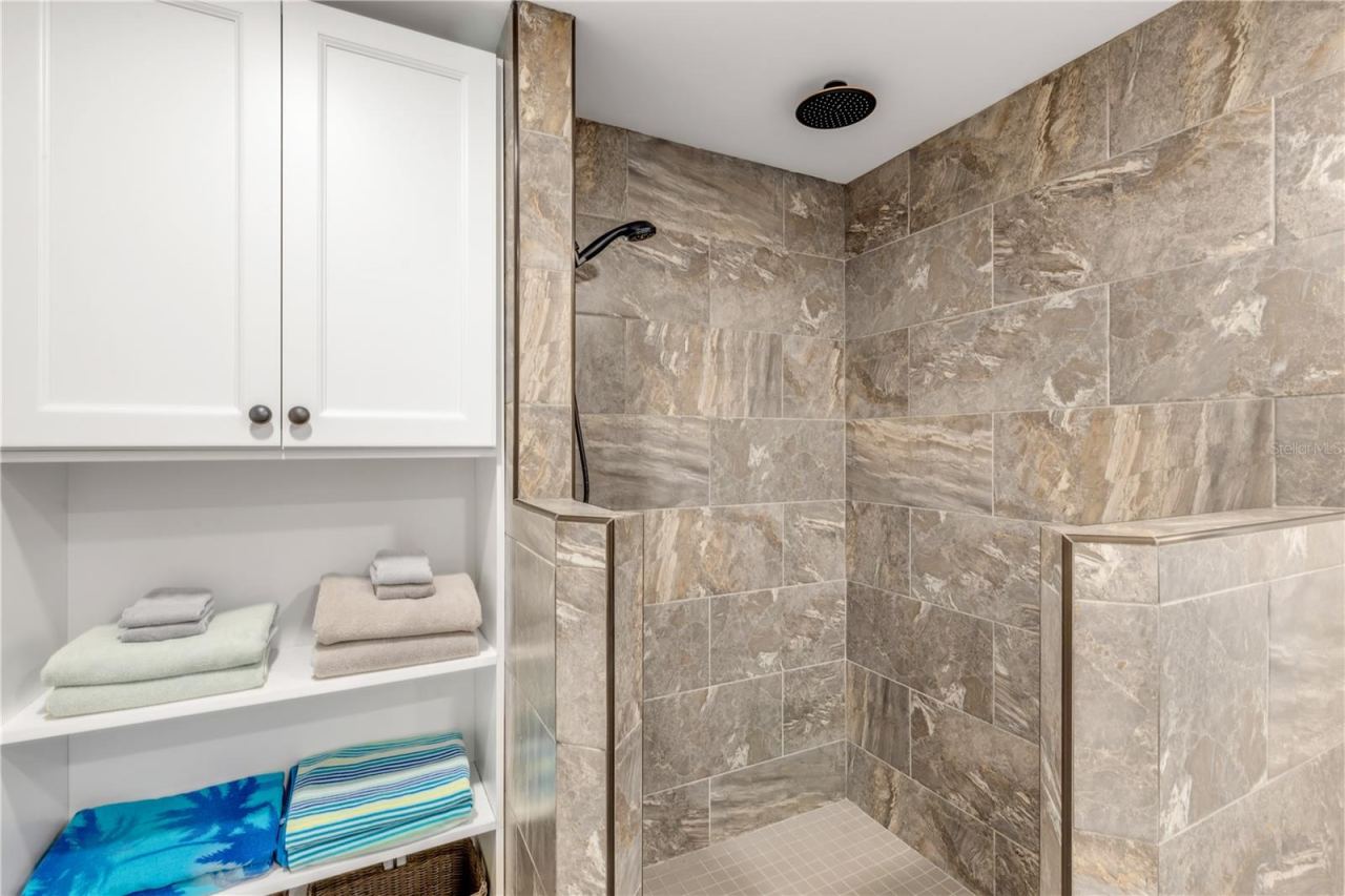Photo 17 of 20: Apartment 1 Walk-in Shower and Linens