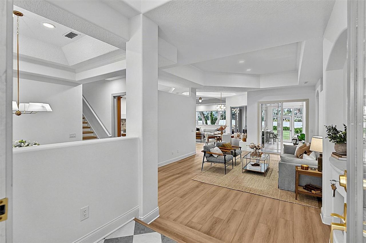 Photo 12 of 20: Front Elegant Foyer to Formal Living Room