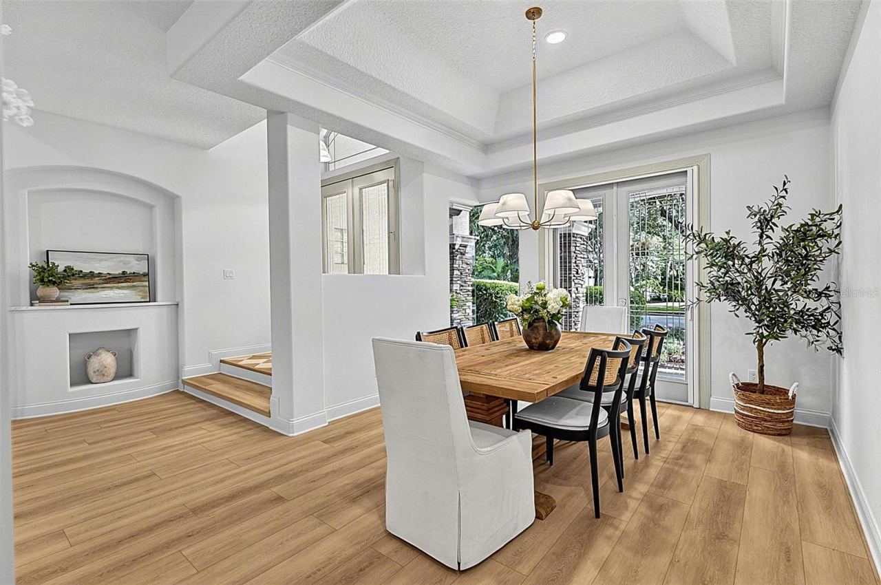 Photo 19 of 20: Front Elegant Foyer/ Formal Dining Room with French doors to front porch