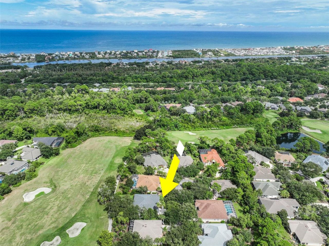 Photo 10 of 20: Aerial View of home on the Jack Nicklaus Golf Course and Ocean just minutes away