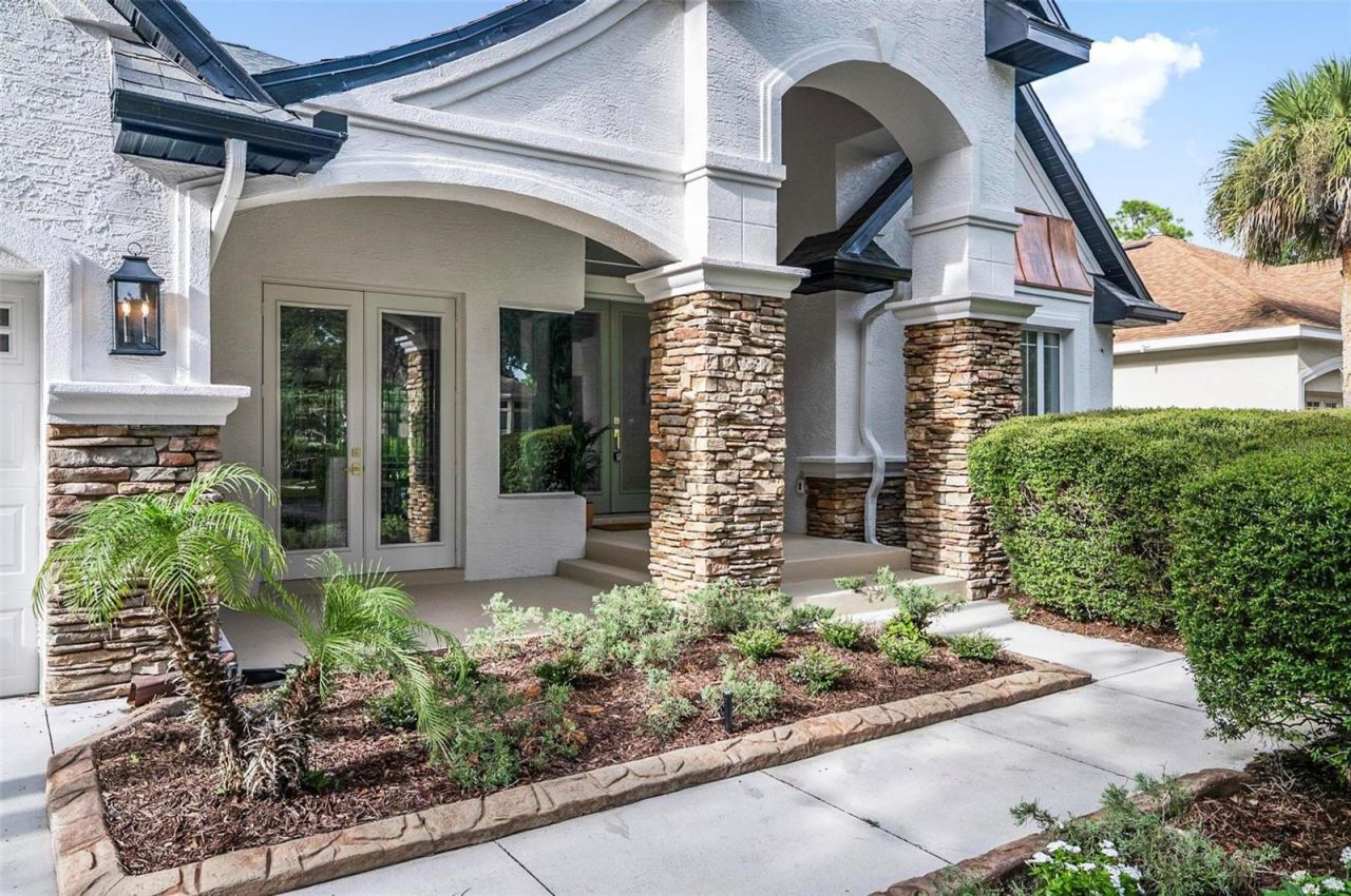 Photo 4 of 20: Tudor Style Front of Home