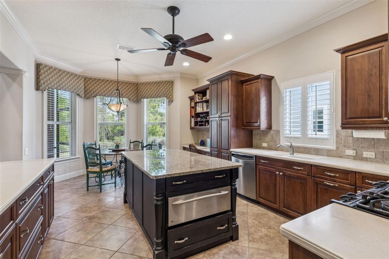 Photo 12 of 20: Center island with a built-in warming door & sliding drawers