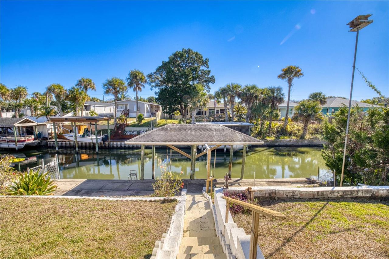 Photo 4 of 20: Boathouse and seawall