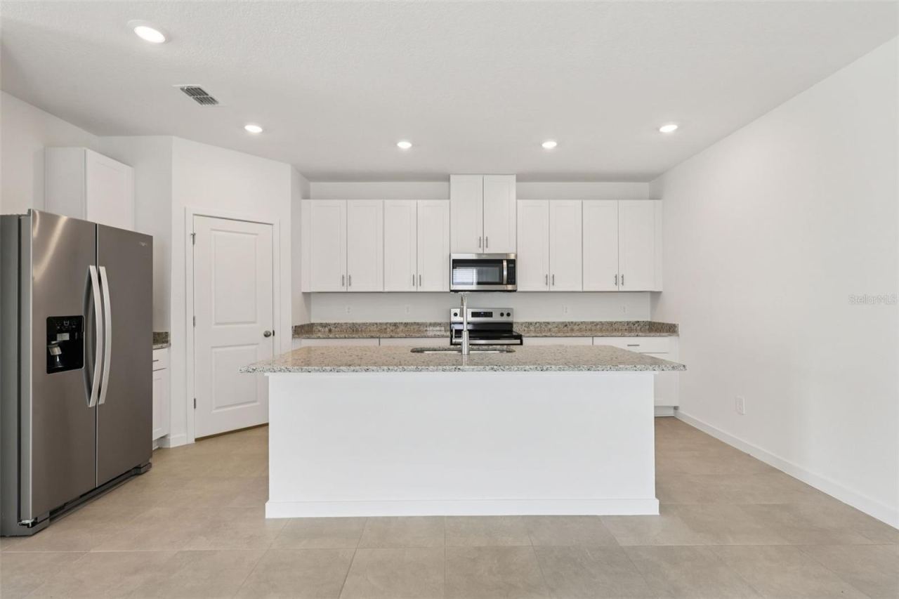 Photo 4 of 13: Photo is not of the actual home, but is an inspirational photo of builder’s model home and may depict options, furnishings, and/or decorator features that are not included.