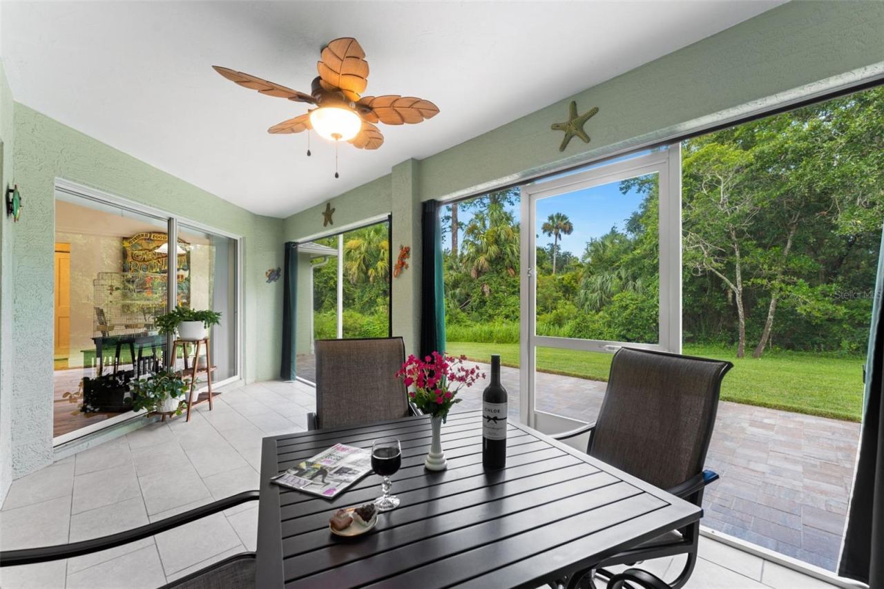 Photo 5 of 20: Screened lanai for dining alfresco.