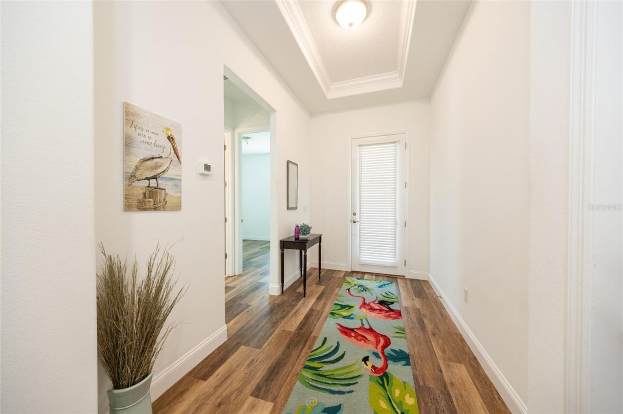 Photo 8 of 20: WELCOMING FOYER WITH BEAUTIFUL LPV FLOORING